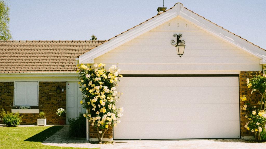Front view of a modern home with a newly replaced garage door
