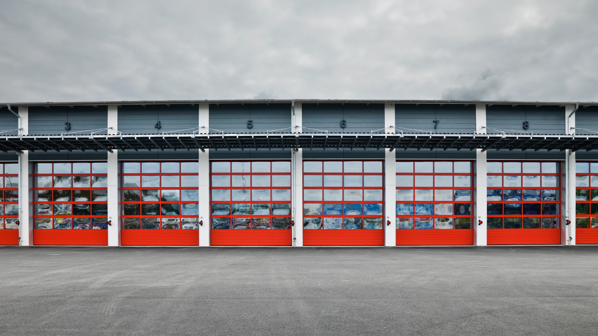 Aluminum and glass industrial garage doors