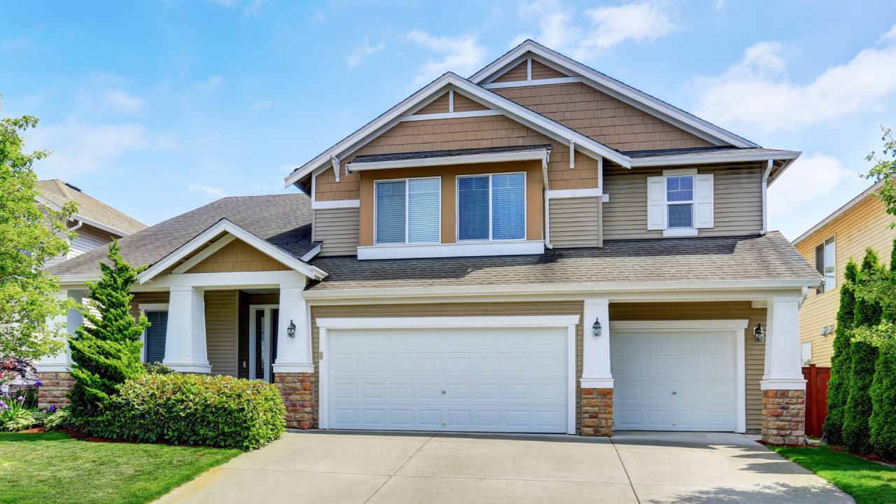 New Garage Doors Their Impact on Curb Appeal and Home Value