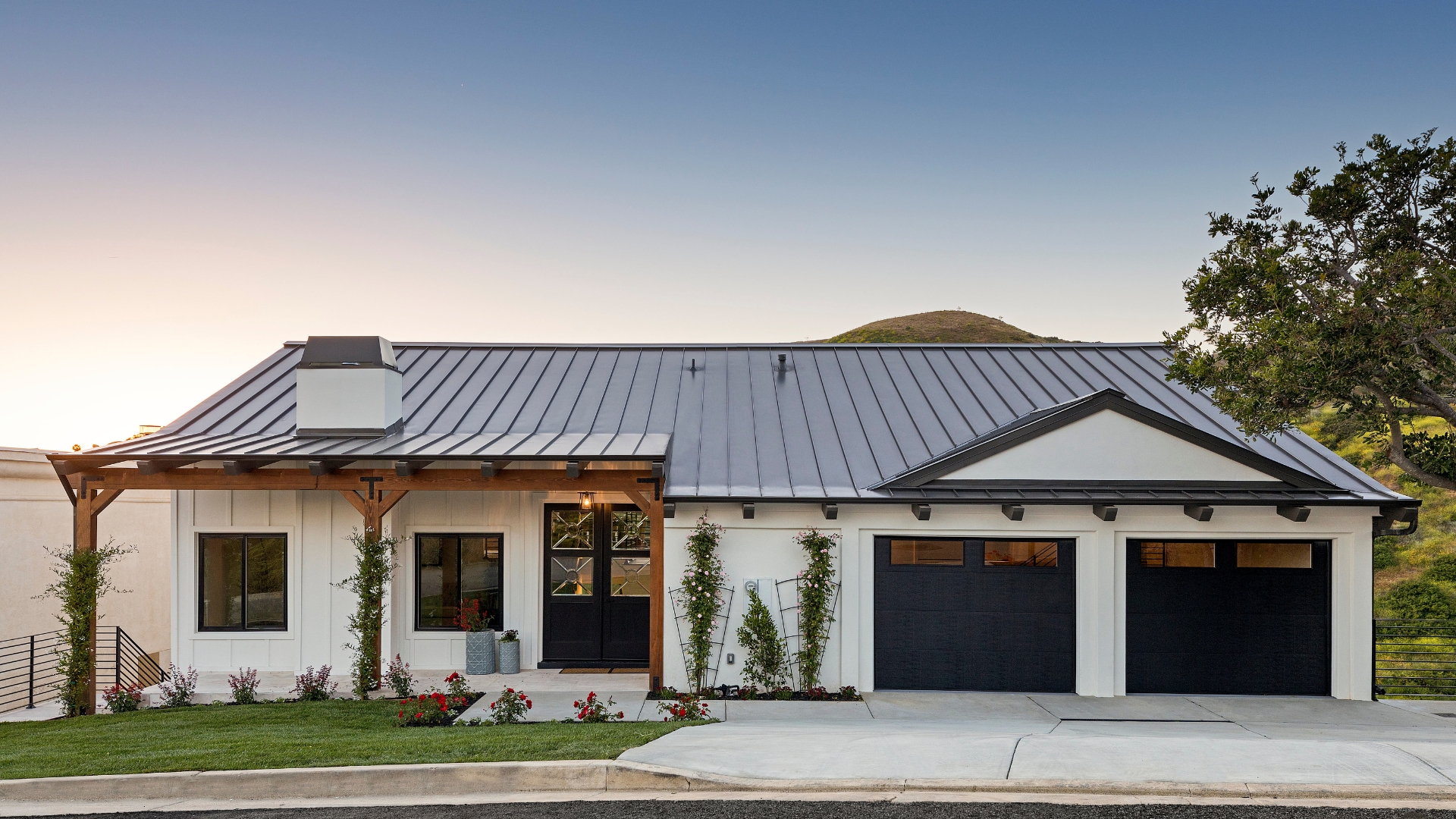 A house with doors in black garage door color