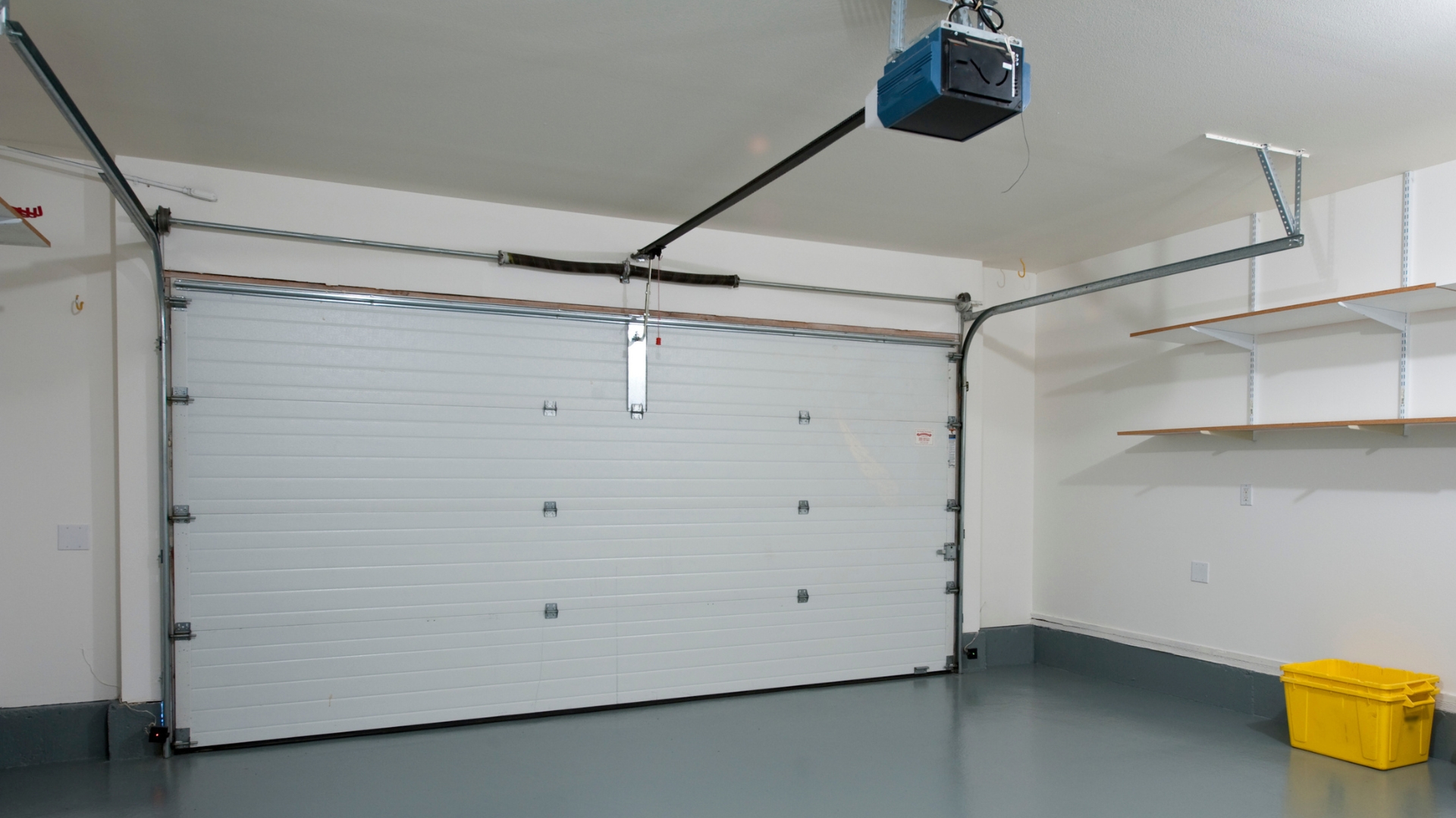 An image of a garage door system from the inside of the garage