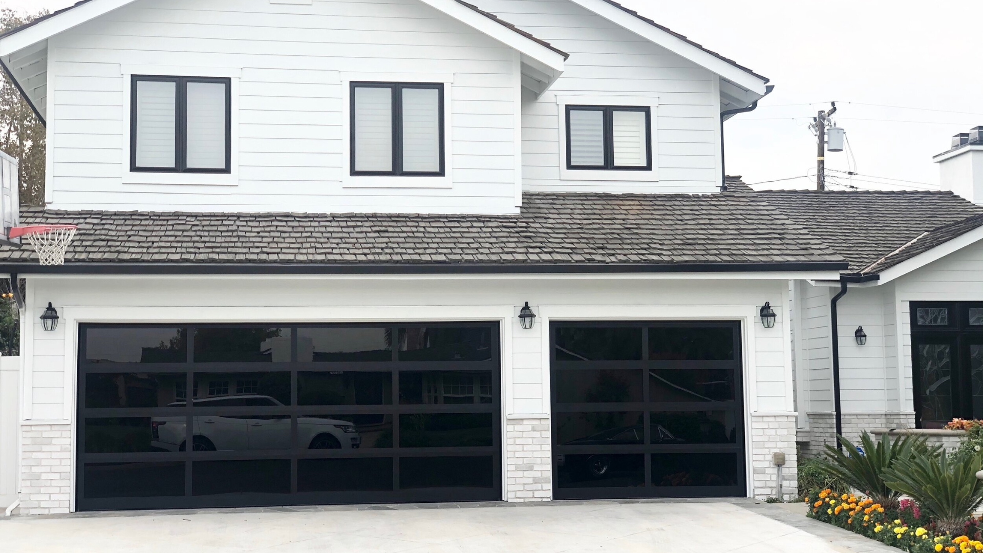 residential garage doors A house with glass garage doors