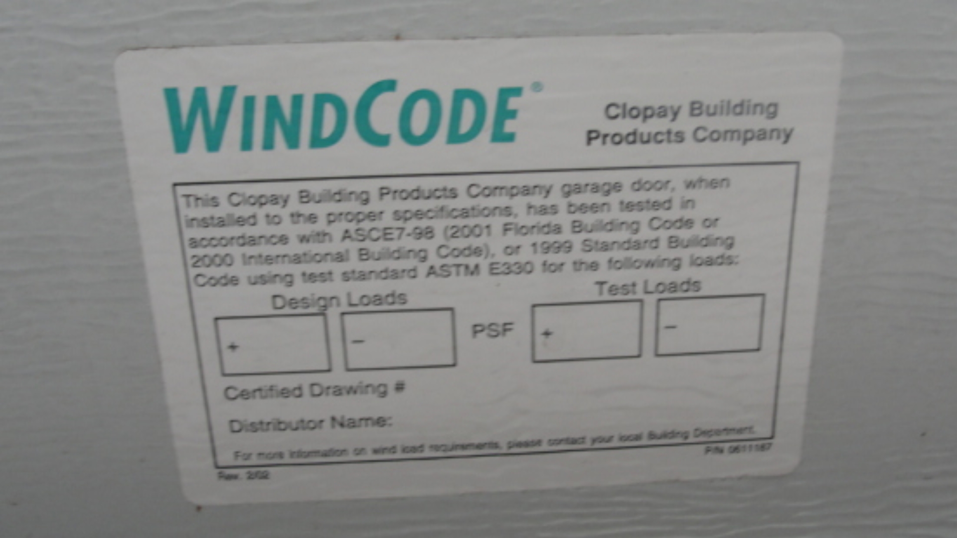 A sample WindCode rating label on hurricane garage doors