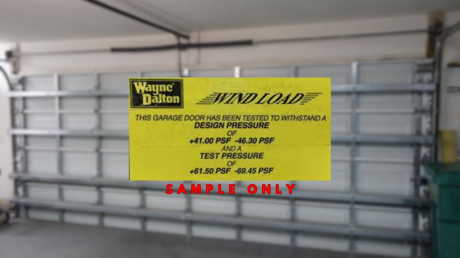 Wind load certification sticker displaying garage door wind code ratings