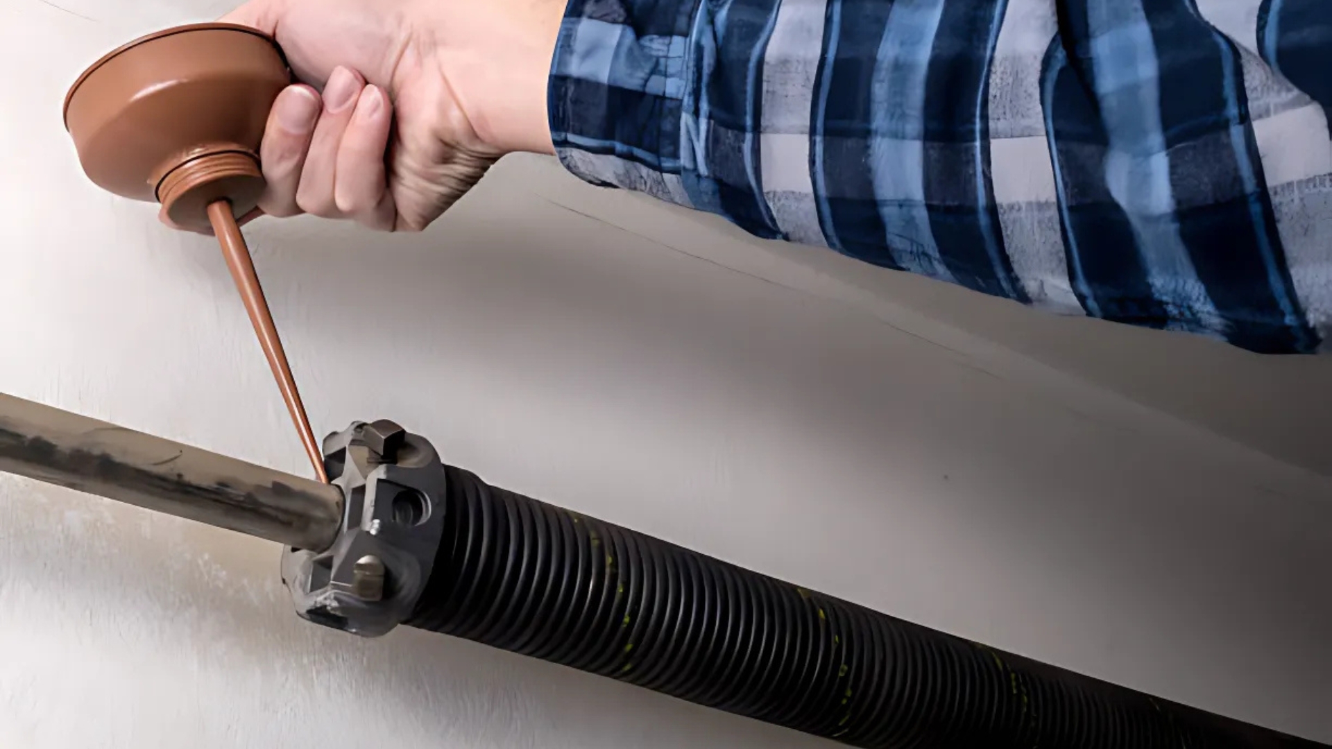 Lubricating torsion spring to prevent noise and extend lifespan