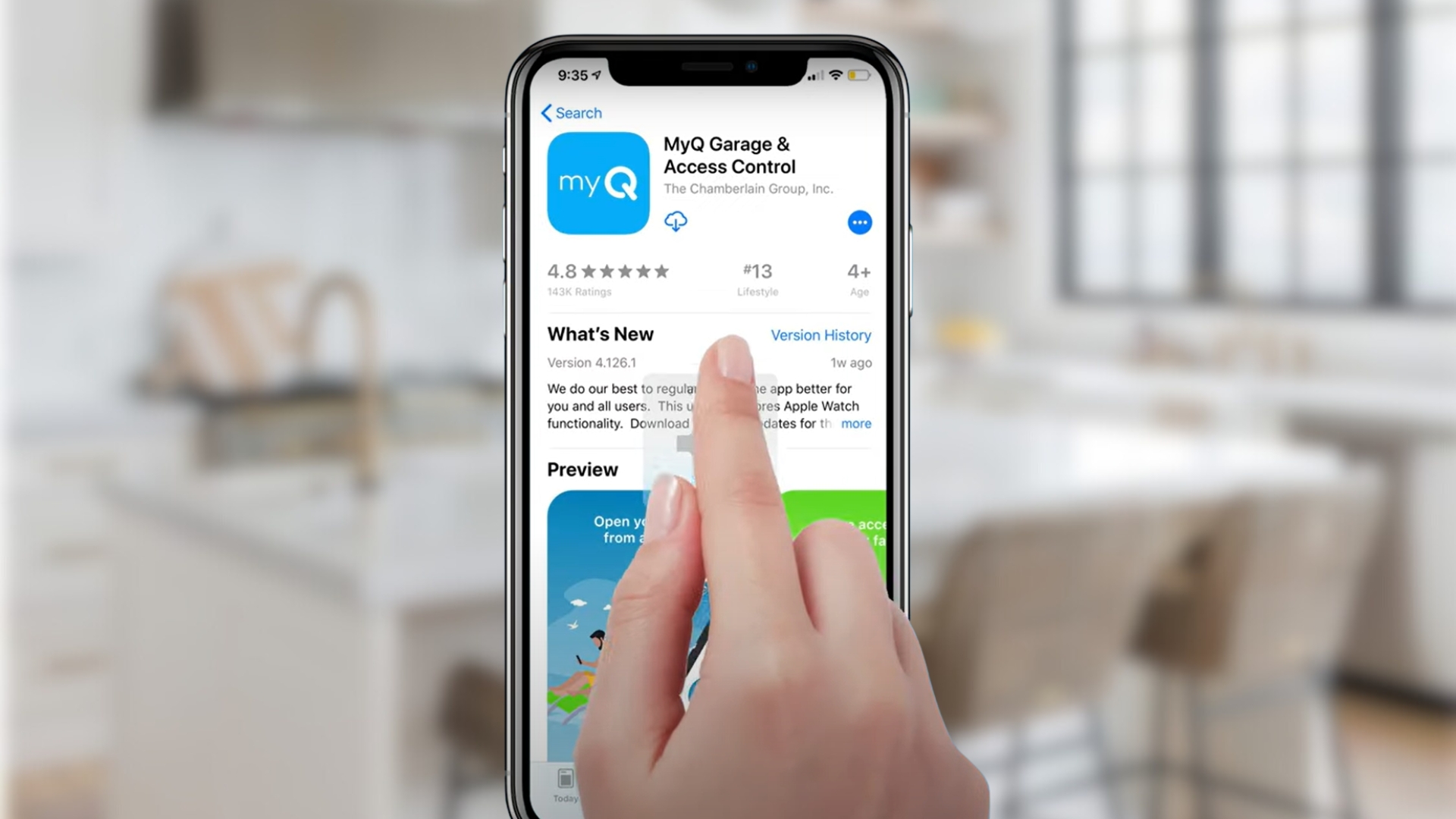 Homeowner downloading myQ Garage Door app for garage door setup