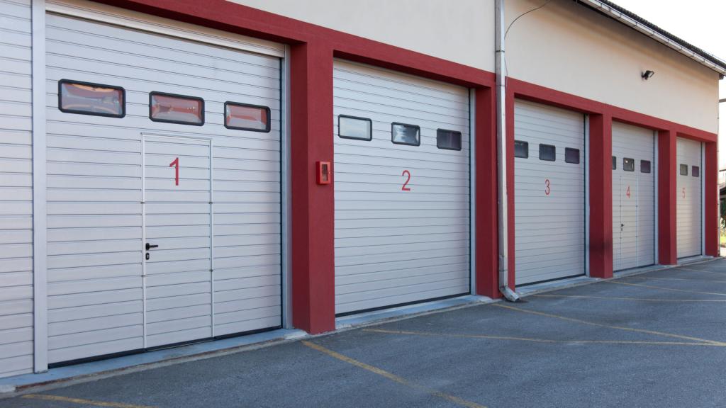 Commercial garage doors with multiple overhead doors at a business facility